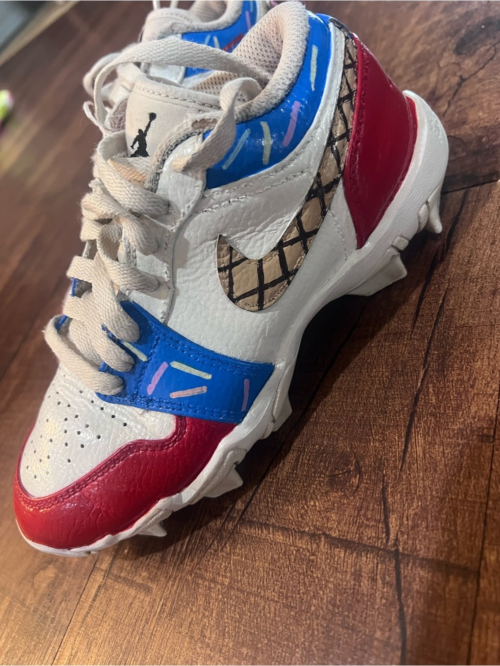 Nike Kids White Sneakers with Red & Blue Accents